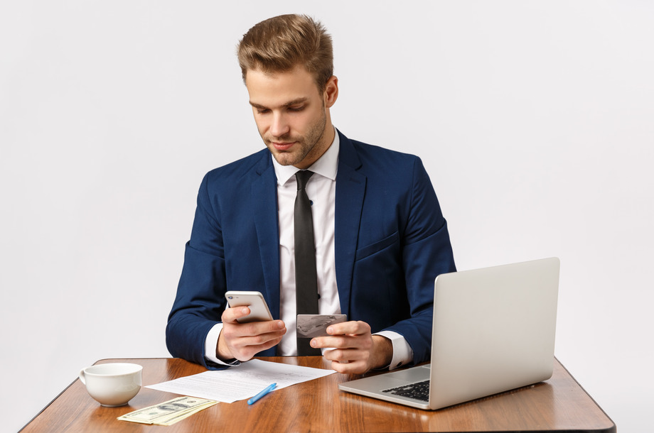 young businessman makes online purchases